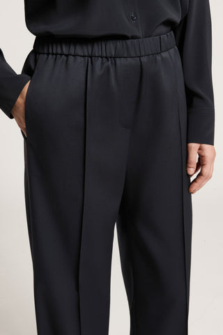 Technical pure wool gabardine trousers