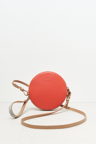 Round genuine leather bag with wristband and shoulder strap