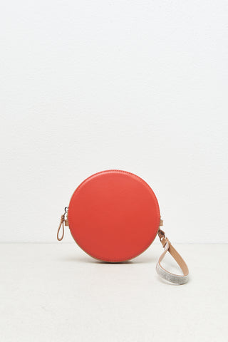 Round genuine leather bag with wristband and shoulder strap