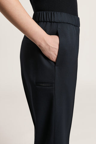 Wool gabardine carrot trousers