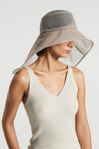 Asymmetrical semi-transparent hat