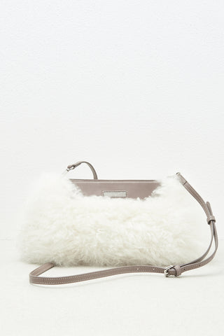 Real fur and real leather clutch bag