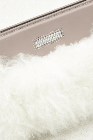 Real fur and real leather clutch bag