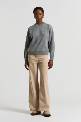 Garment-dyed denim jeans