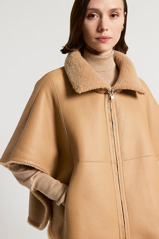 Reversible real shearling cape