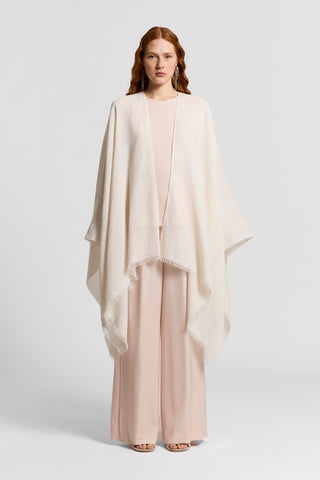 Cotton and linen poncho with Punto Luce detailing