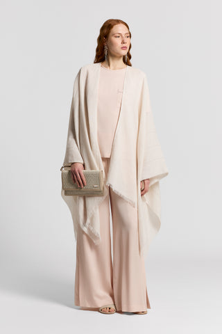 Cotton and linen poncho with Punto Luce detailing