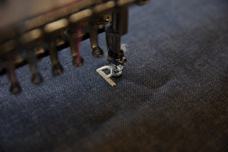 Garment-dyed denim jeans